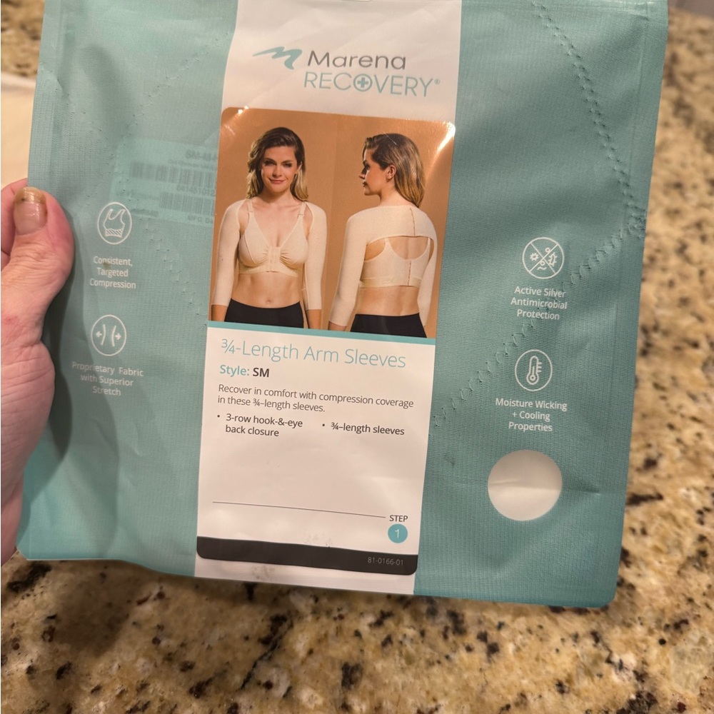 TWO Brand New. Package still sealed. Arm sleeve compression. Marena
